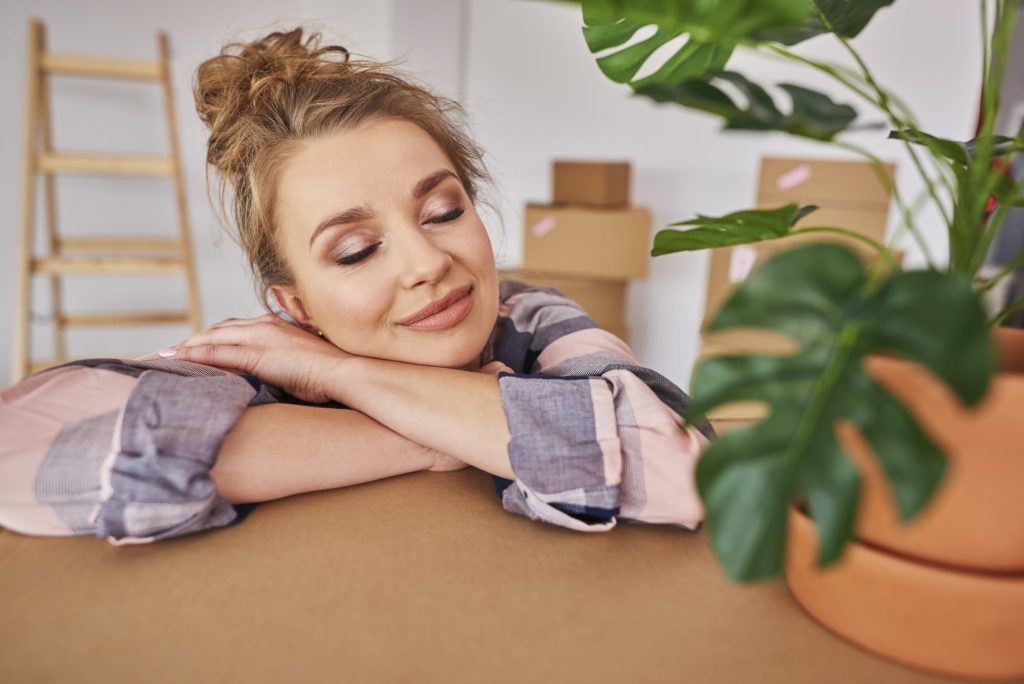 Young woman enjoying the new apartment